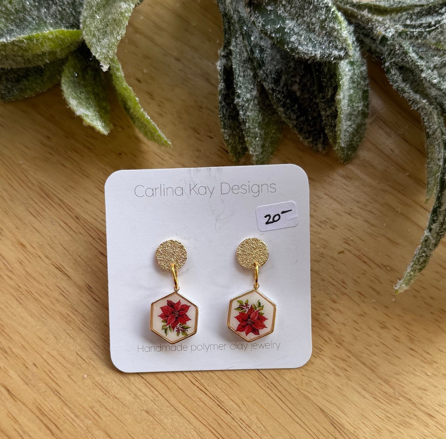 Red poinsettia charm earrings