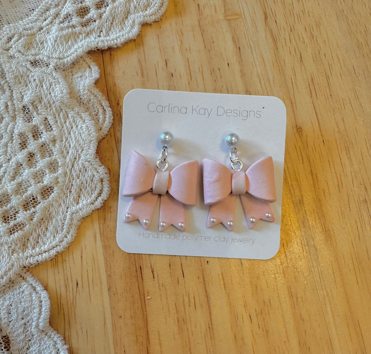 Pale pink bow earrings