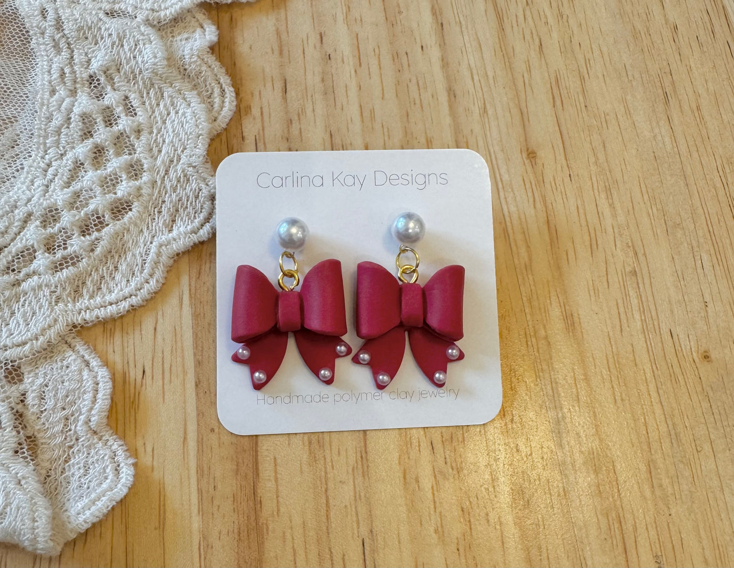 Red bow earrings