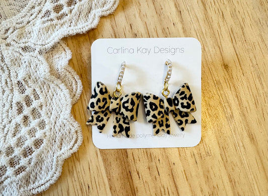 Leopard print pearl bow earrings