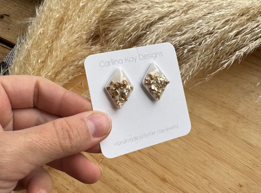 Large white diamond and gold studs