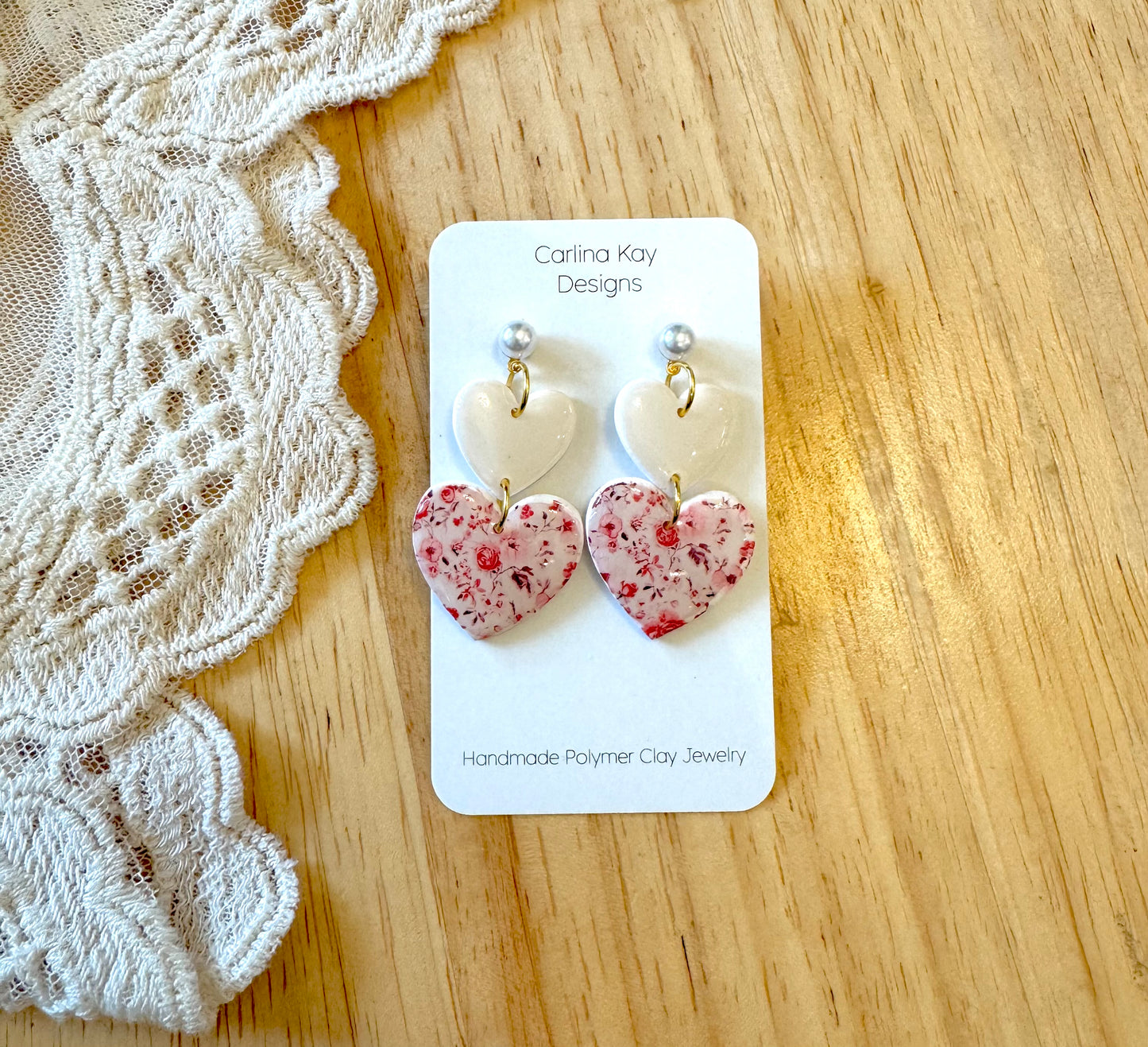 White and flower print heart drop down earrings