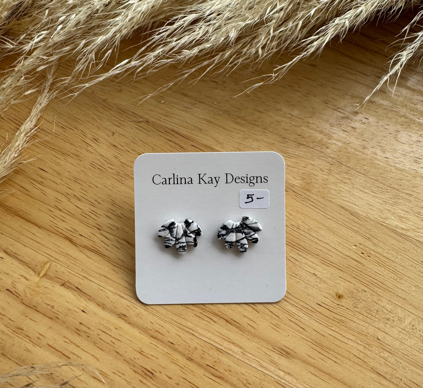 Black and white marbled fan stud earrings