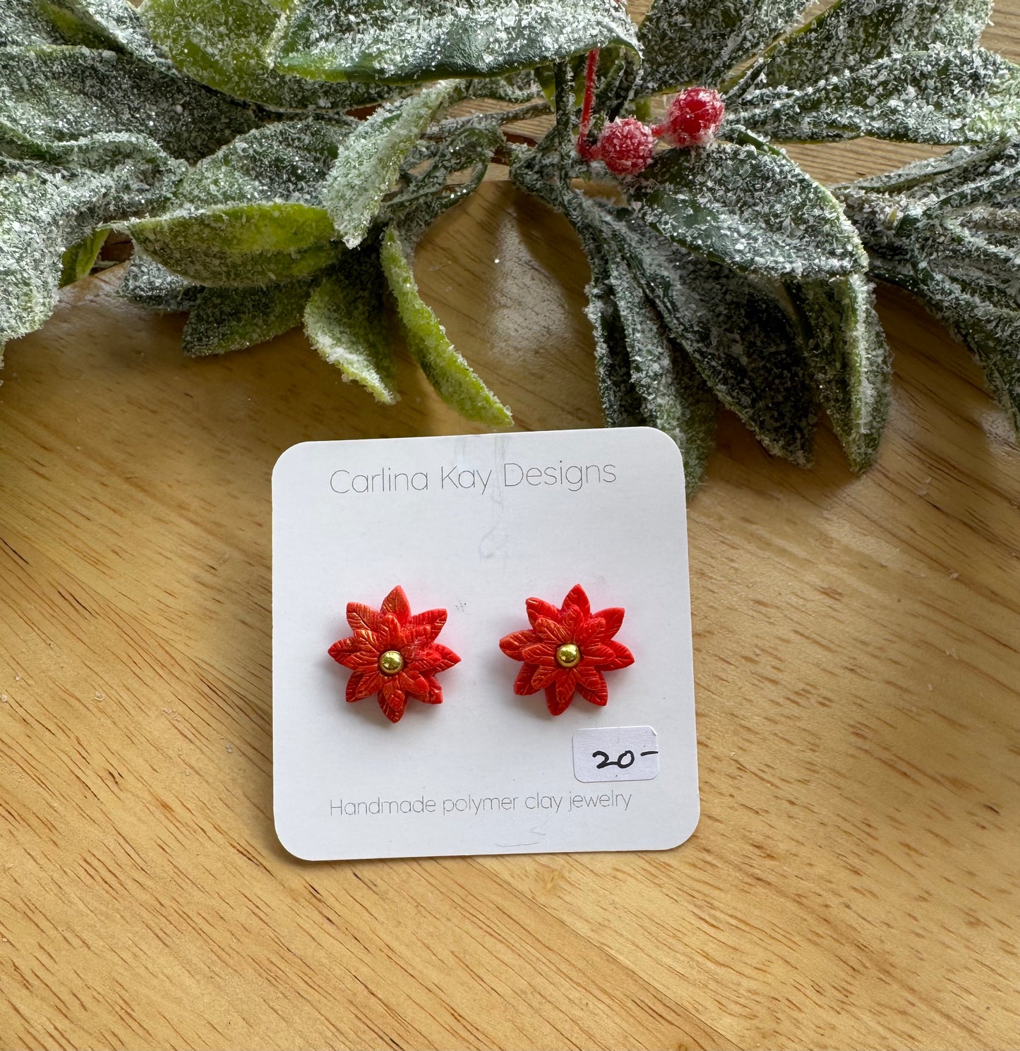 Poinsettia stud earrings with one gold bead