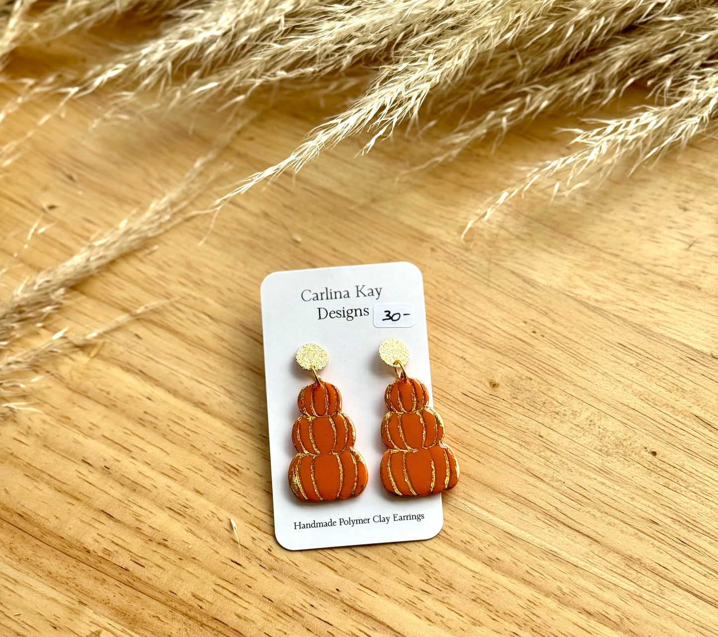 Gold foil stacked orange pumpkin earrings