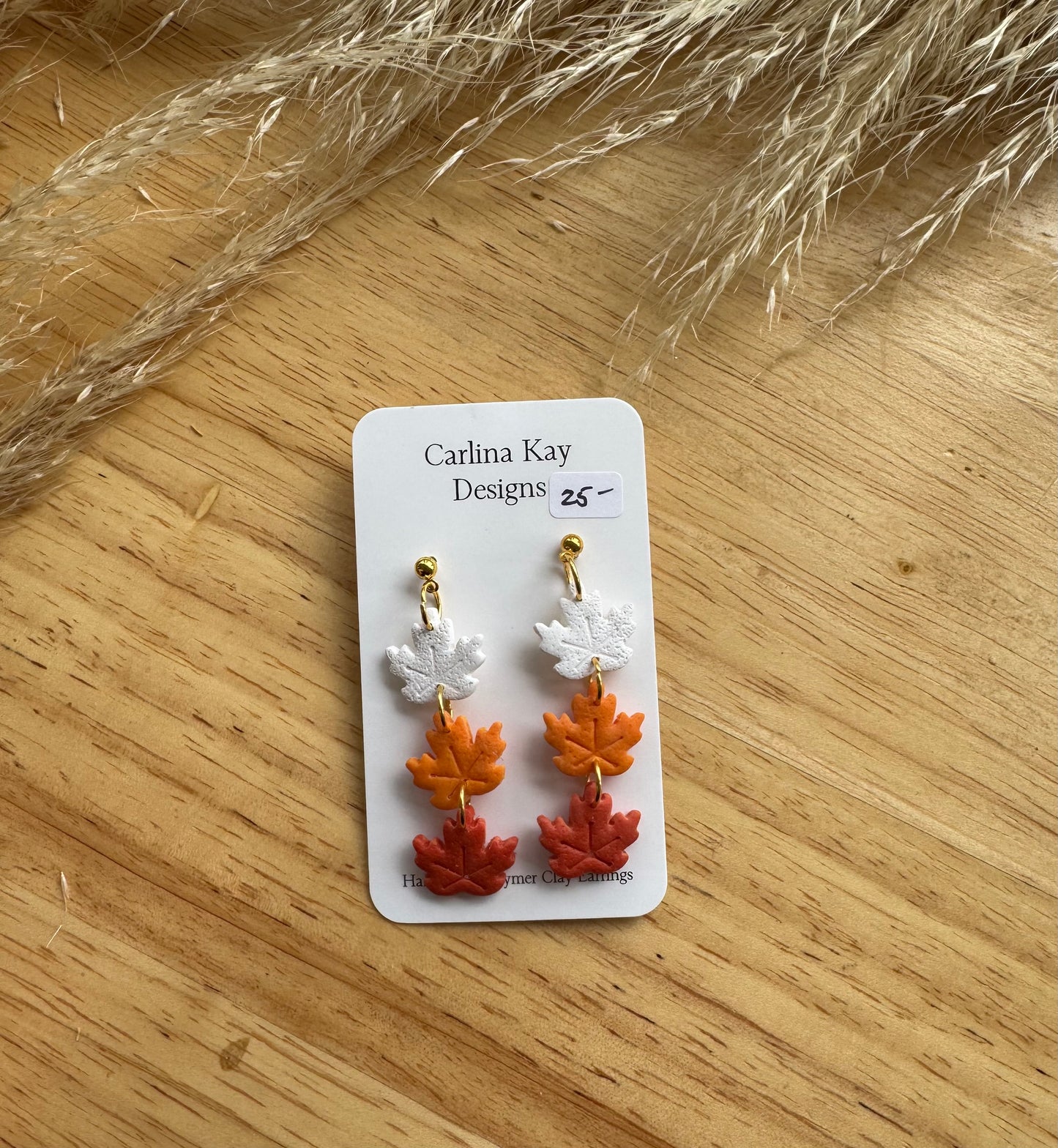 Three leaf stacked drop down earrings