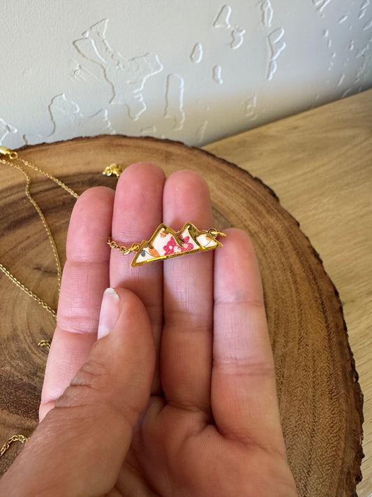 Gold floral mountains