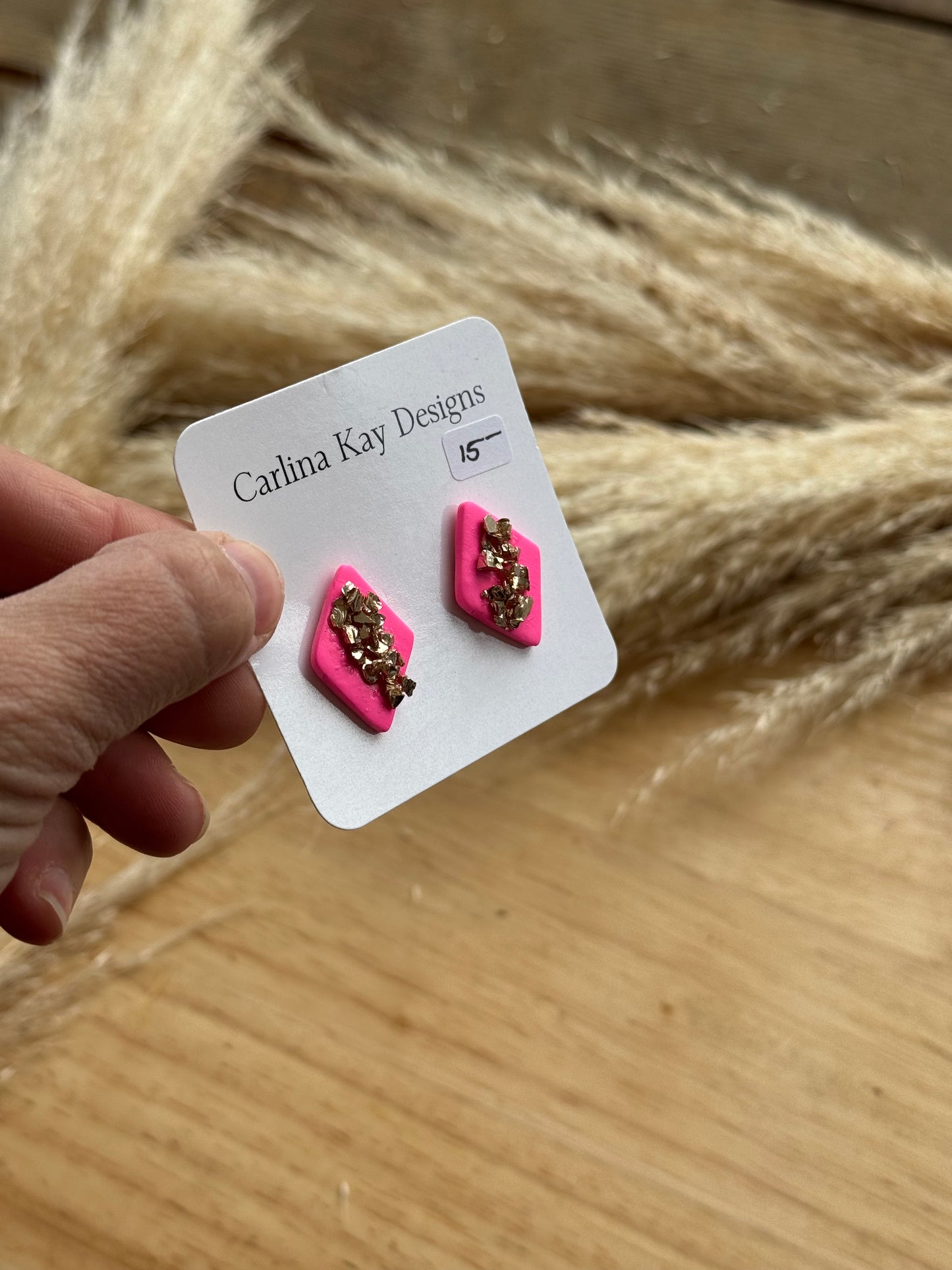 Hot pink and gold diamond studs