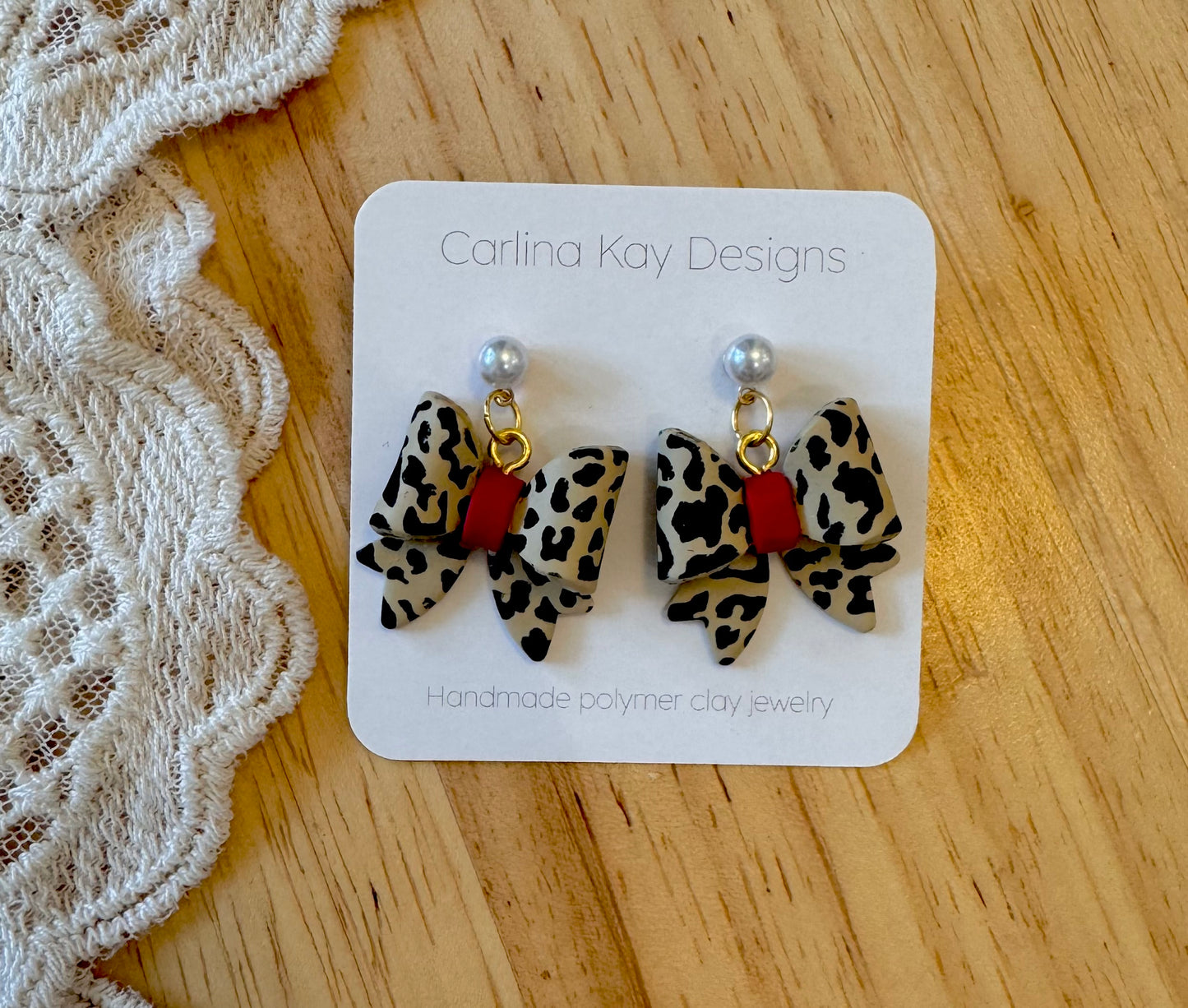 Leopard print bows with red earrings
