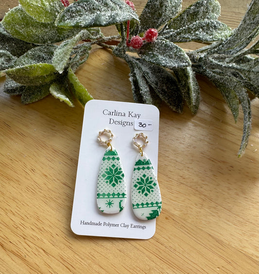 Green and white Christmas sweater drops